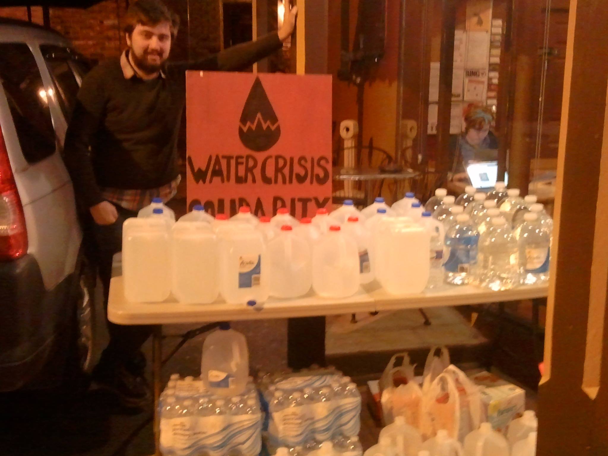 Dylan with water collected